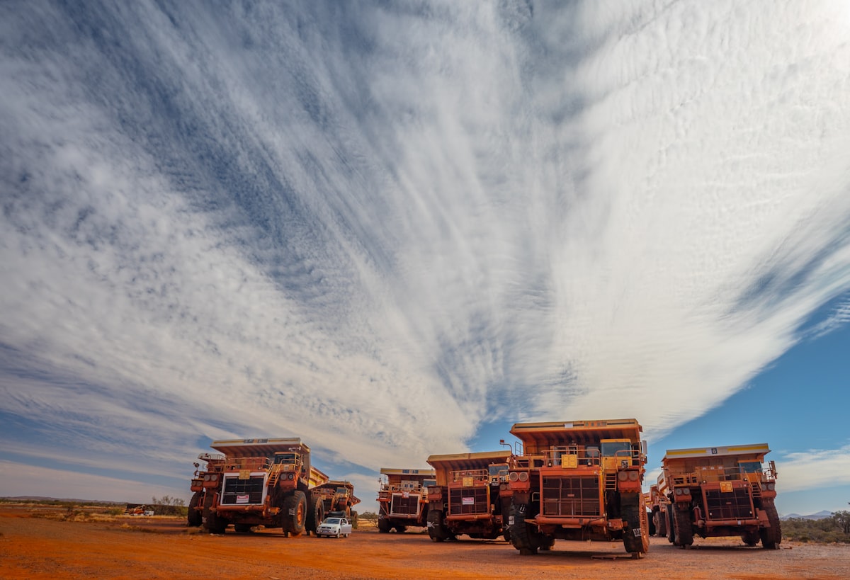 Fleet of mining haul trucks representing the Kathu Mining Corridor